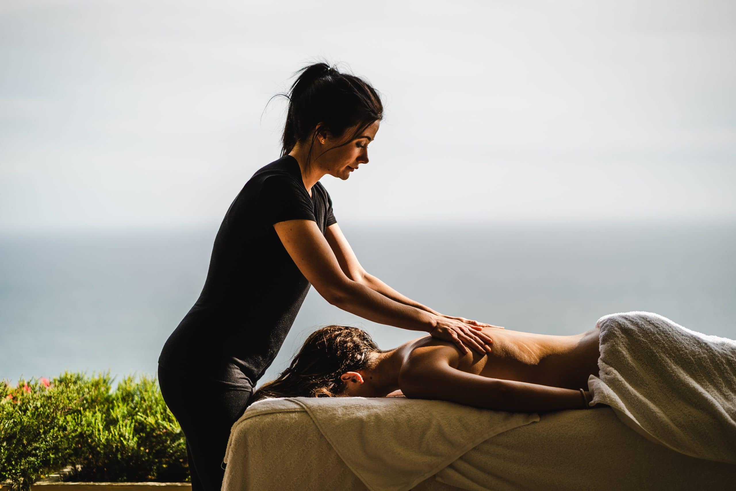 A guest enjoying a massage at 21 Nettleton