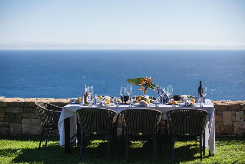 A lunch setup overlooking the Atlantic Ocean at 21 Nettleton, Cape Town